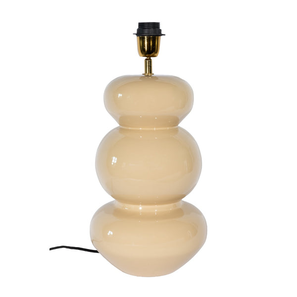 Becca bordslampfot med högblank emaljartad yta. Beige färg. Frontvy