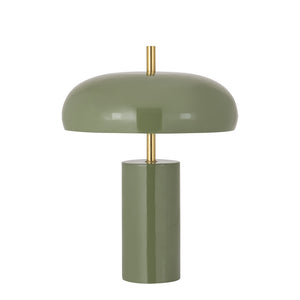 Grön bordslampa med cylindrisk fot och kupolformad skärm i glas med mässingsdetaljer