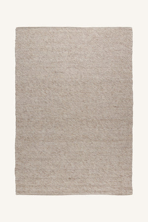 Beige handvävd matta i jute med naturlig textur och hållbar design