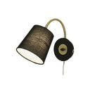 Svart vägglampa med böjbar arm i mässing och textilskärm