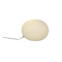 Oval bordlampa i vitt glas med grå sladd, modern design för mjuk belysning