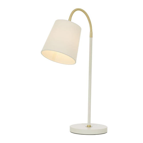 Vit bordslampa med guldfärgad böjbar arm och rund lampskärm i tyg