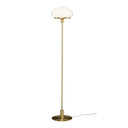 Golvlampa i mässing med vit glasskärm i svampform, modern design med rund fotplatta