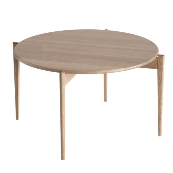 Runt soffbord i ljust trä med tre ben och geometrisk design