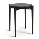 Runt sidobord i svart trä med tre ben och läderdetaljer