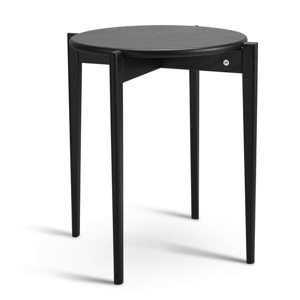 Runt sidobord i svart trä med tre ben och läderdetaljer