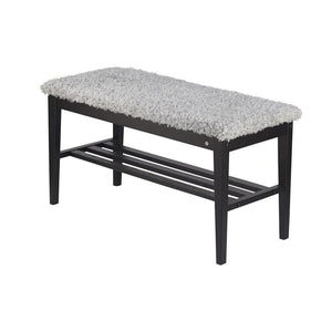 Hallbänk med svart träram och grå fluffig sittdyna, samt förvaring under sitsen