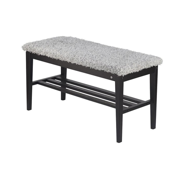 Hallbänk med svart träram och grå fluffig sittdyna, samt förvaring under sitsen