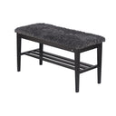 Svart hallbänk med grå luddig sits och ribbor under, perfekt för förvaring av skor