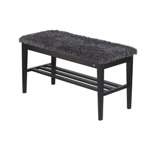 Svart hallbänk med grå luddig sits och ribbor under, perfekt för förvaring av skor