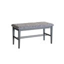 Hallbänk med grå yllad sittdyna och mörkgrå träben samt skoförvaring undernåt