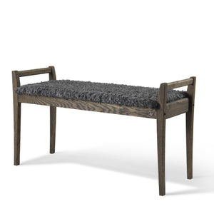 Bänk i mörkbetsad ek med grå fårskinnssits och armstöd