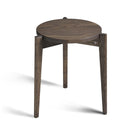 Runt träbord med tre ben i mörkt trä, sidabord eller pall i modern skandinavisk design