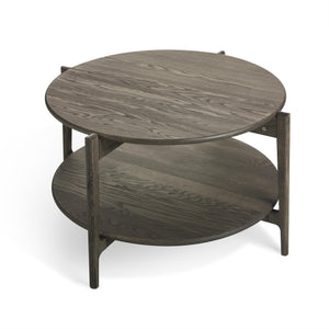 Runt soffbord i grå ek med två nivåer och träben, ovanifrån