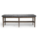 Bänk med grå pälsliknande sits och mörkbrun träram med öppen hylla