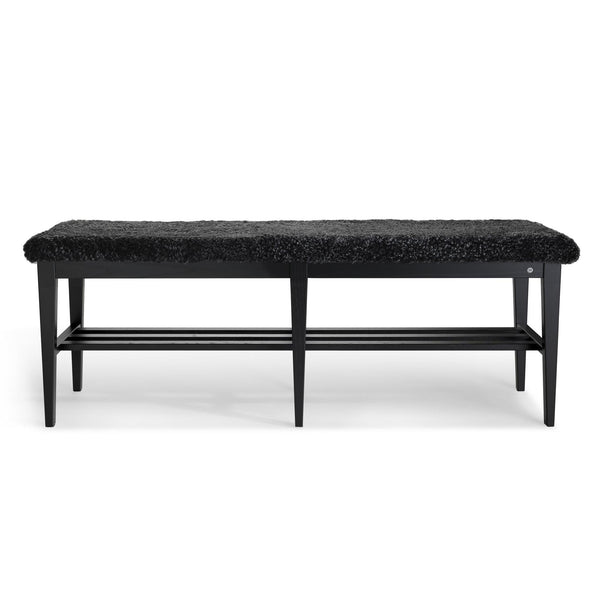 Svart hallbänk med fluffig sits och förvaringshylla under, modern design med träben