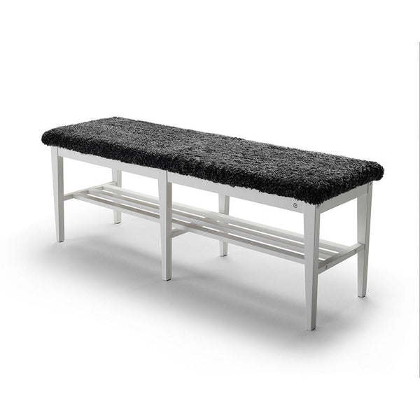 Hallbänk med vit metallstomme, svart fluffig sits och skoförvaring under