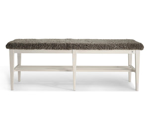 Bänk med sits i grått bouclé och vit träram med förvaring