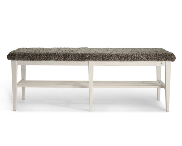 Bänk med sits i grått bouclé och vit träram med förvaring