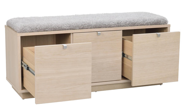 Hallbänk i ljust trä med tre utdragbara lådor, öppna fack och grå sittdyna på toppen