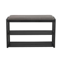 Sittbänk med svart träram, grå dyna och två hyllplan för skoförvaring