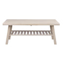 Soffbord i ljust trä med hylla undertill och snedställda ben i skandinavisk design