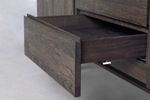 Utdragen låda i mörkbrun ekfanér med synlig trästruktur och moderna metallskenor