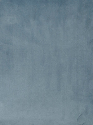 Ljusblå textilbakgrund med mjuk struktur och naturliga veck