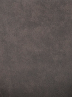 Mörkgrå texturerad yta med sliten betongliknande finish, industriell stil