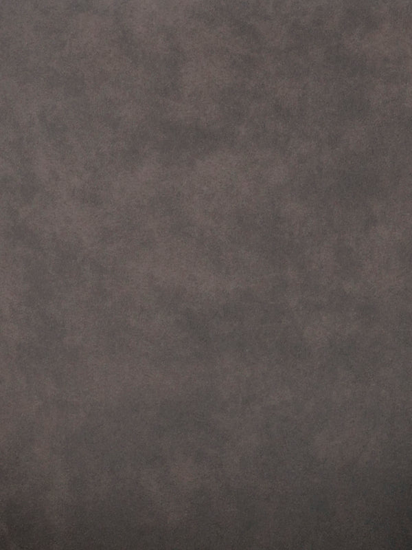 Mörkgrå texturerad yta med sliten betongliknande finish, industriell stil