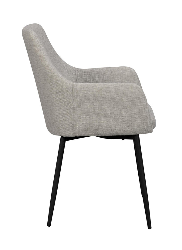 Grå matstol med armstöd och svarta ben i metall, sidovy som visar stolens ergonomiska design och textilklädsel