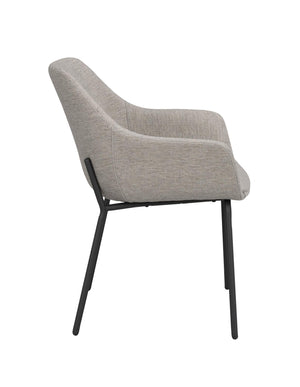 Grå stoppad matstol med svarta metallben, sedd från sidan