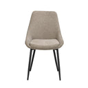 Beige stoppad matstol med svarta metallben i modern skandinavisk design