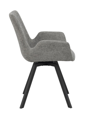 Grå stoppad stol med svarta träben, visad från sidan mot vit bakgrund