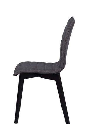 Grå stoppad matstol med svarta träben, sidovy som visar hög rygg och modern design