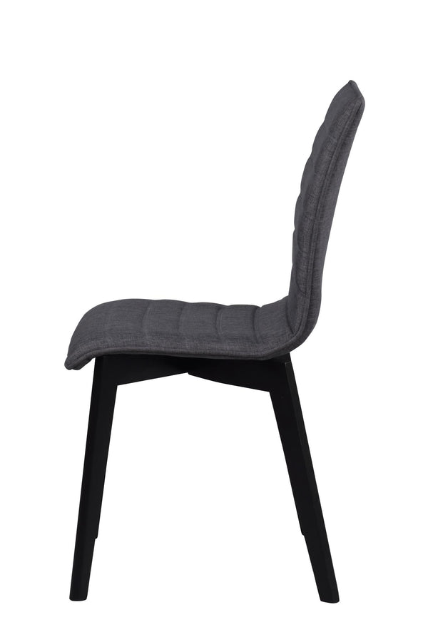 Grå stoppad matstol med svarta träben, sidovy som visar hög rygg och modern design