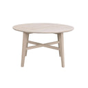 Runt soffbord i ljust trä med krysskena och fyra ben i skandinavisk design