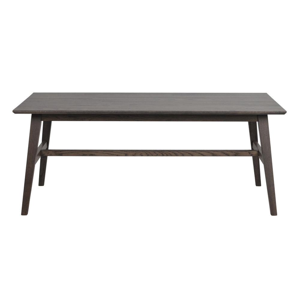 Grått träbord med raka ben och tvärslå i modern skandinavisk design