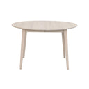 Runt matbord i ljust trä med fyra ben och minimalistisk skandinavisk design