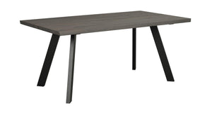 Matbord med grå träskiva och sneda svarta metallben i modern skandinavisk design