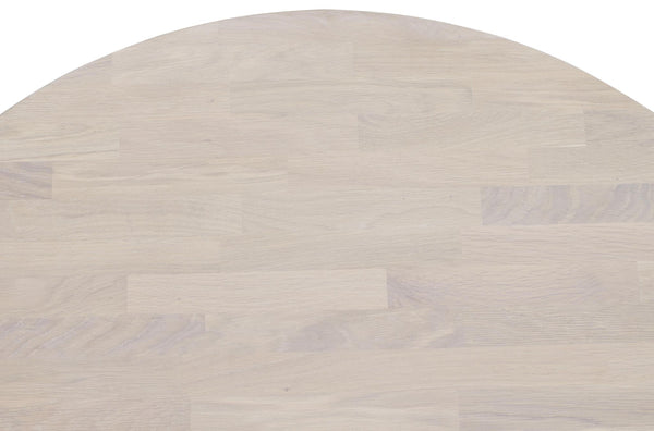 Ljus ekfärgad bordsskiva i trä med rundad ovankant och synlig trästruktur