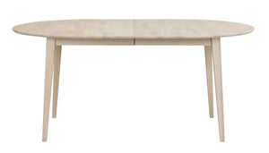 Oval matbord i ljust trä med utdragsfunktion och fyra spetsiga ben i skandinavisk design