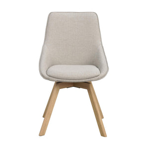 Modern matstol med beige klädsel och träben i ljus ek, skandinavisk design