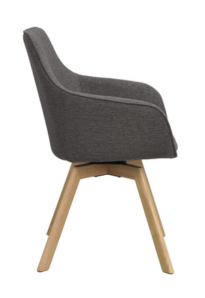 Grå matstol med träben i ek, sidovy som visar svängbar funktion och ergonomisk rygg