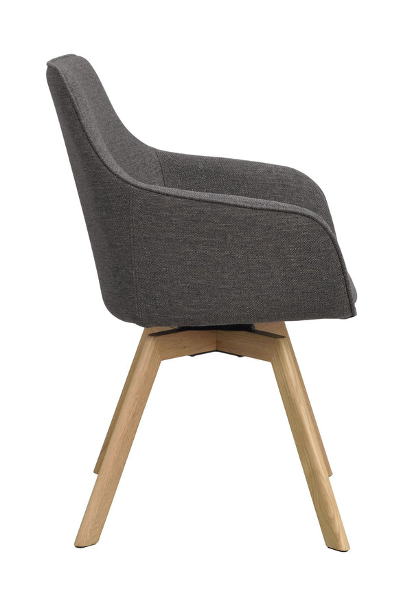 Grå matstol med träben i ek, sidovy som visar svängbar funktion och ergonomisk rygg