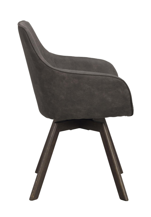 Grå stoppad matstol med svängd rygg och mörka träben, visad från sidan