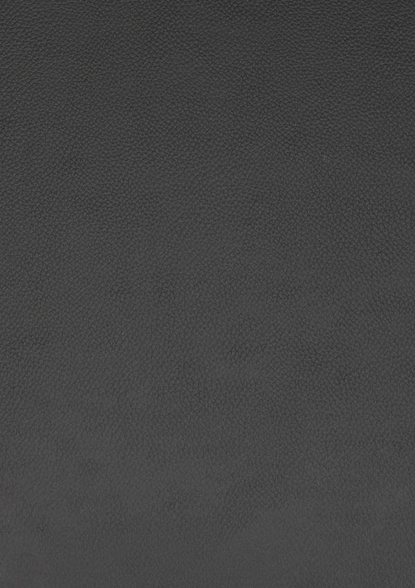 Mörk grå läderstruktur med finmönstrat präglat ytskikt, texturerad bakgrund i antracit