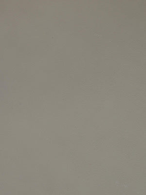 Grå beige slät vägg med neutral ton, perfekt bakgrund för produktfotografering