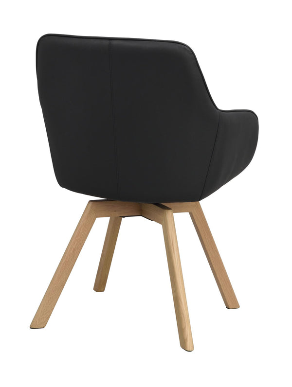 Svart stol med träben i ek, modern design med ergonomisk rygg, sedd bakifrån