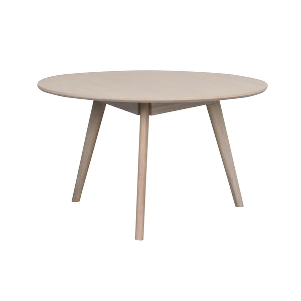 Runt matbord i ljust trä med tre ben i skandinavisk design